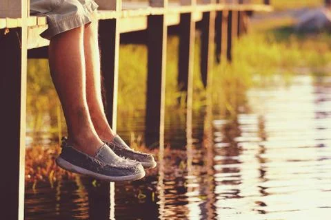 Legs dangling Stock Photos