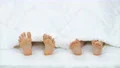 The legs exercise with legs on the bed. view from above 4k or 4k+ Resolution