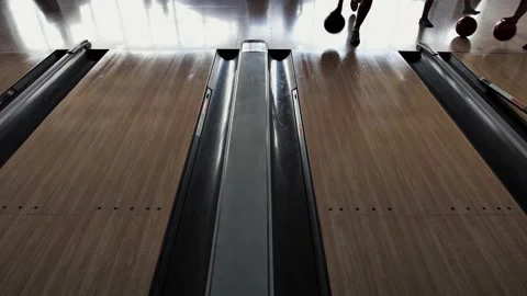 Legs of a girl who throws a bowling ball. Active rest in the bowling club. Stock Footage 203151453