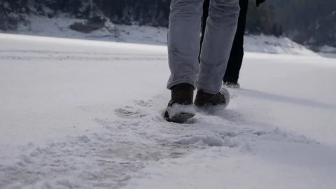 Legs glide on snowy ice Video stock 120525992
