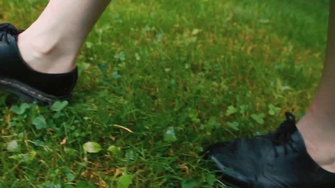 Legs on the grass Stock Footage 95416074