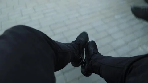 Legs of a guy in a swinging swing Stock Footage 194096638