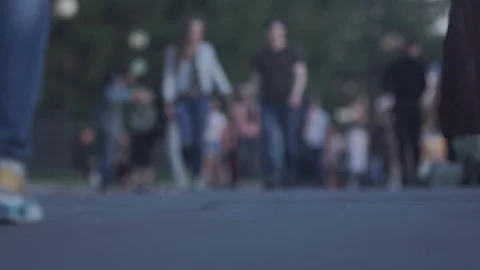 Legs in the human crowd Видео 78016178