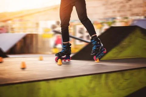 Legs on inline skates. Stock Photos
