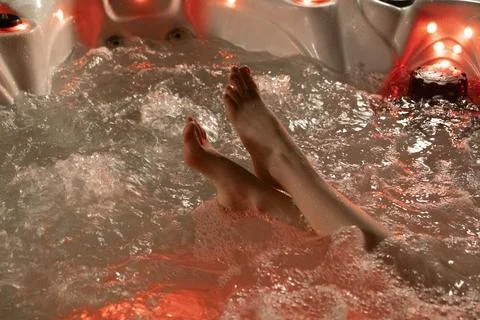 Legs in jacuzzi. Stock Photos