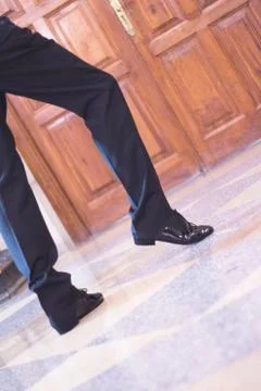 Legs of man dancer in motion Stock Photos