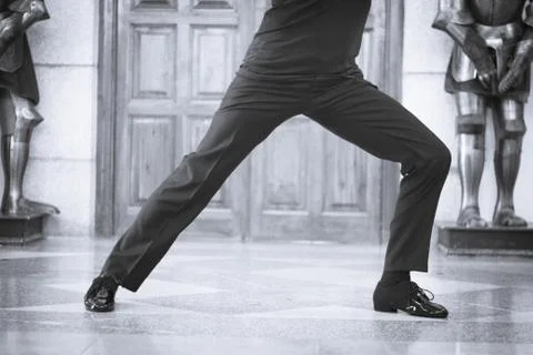 Legs of man dancer in motion Stock Photos