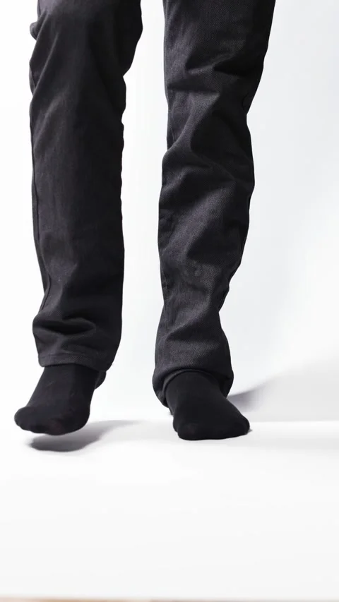 Legs of a man demonstrating black socks ... | Stock Video | Pond5