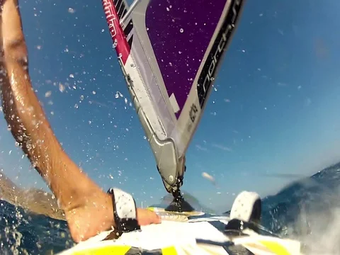 Legs Of a Man Doing Windsurfing Video stock 76412549