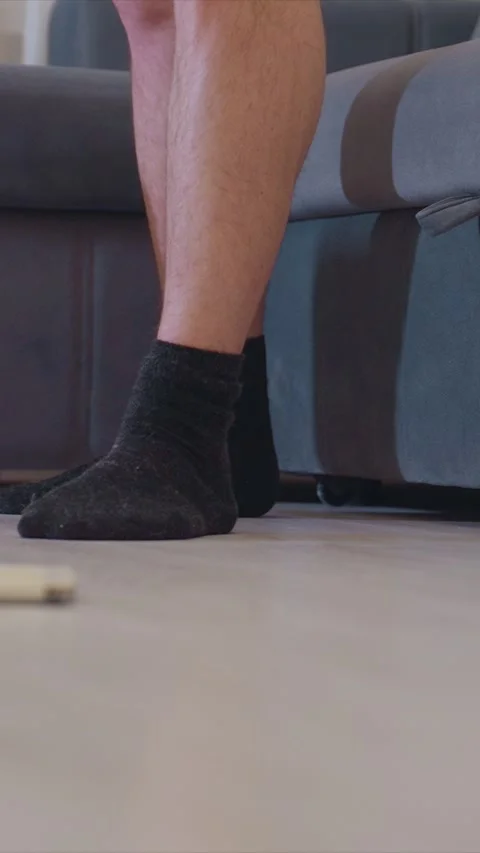 Legs Mopping Hard Surface Flooring Near Sofa featuring floor cleaning home Stock Footage 348037750