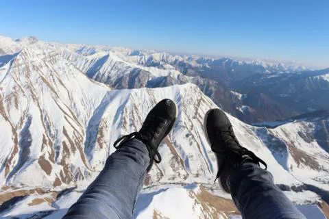 Legs onn parallel while doing paragliding Stock Photos