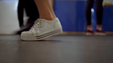 Legs of passing people close-up. Bottom view 스톡 동영상 115364376