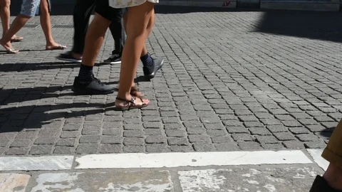 Legs of people walking in multiple directions Stock Footage 113012075