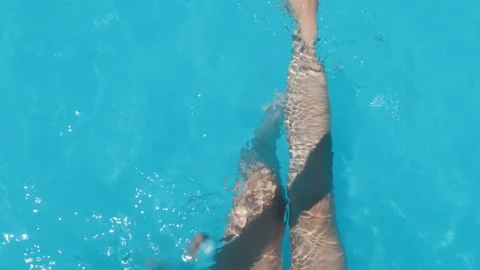 Legs in the pool Vacation at summer Video stock 137263900