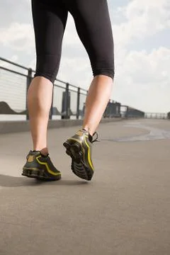 Legs of runner Stock Photos