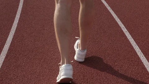 Legs of a runner running on the track Stock-Footage 130168217