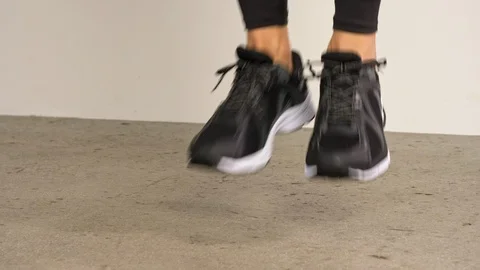 Legs on running shoes while jumping Video stock 105129380