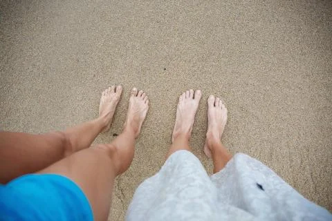 Legs on the sand Stock Photos