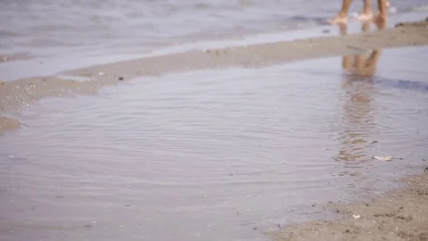 Legs on the sea shore Stock Footage 78792162