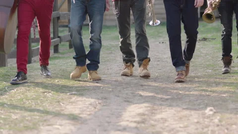 Legs of several men in jeans Stock Footage 237488572