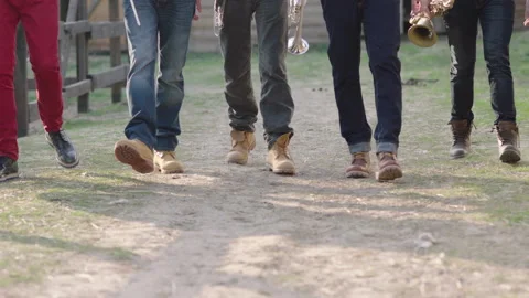 Legs of several men in jeans Stock Footage 237488578