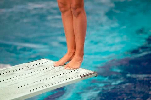 Legs on a springboard Stock Photos