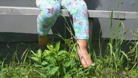Legs sway on the bench Stock Footage 157904918