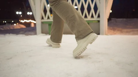 Legs Swirling Inside Light Painted Gazebo With Boots Stock Footage 307458091