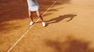 Legs Of Tennis Player On Orange Clay Tennis Court During The Game Stock Footage