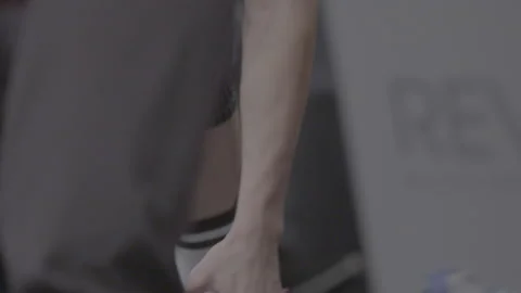 Legs of Two Athletes and a Referee Stock Footage 165608704