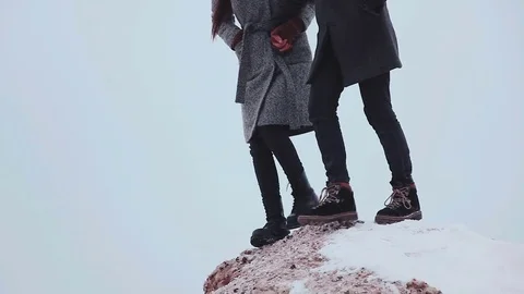Legs of two people, run outside in winter nature Stock Footage 70994031