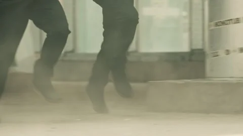 Legs of two policemen running Stock Footage 283063798