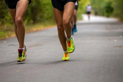 Legs two runners running Stock Photos