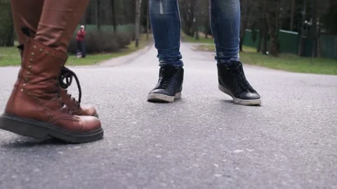 Legs walk on asphalt Stock Footage 130950762