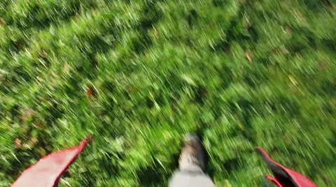 Legs walking fast over grass field - motion blur Stock Footage 46542850