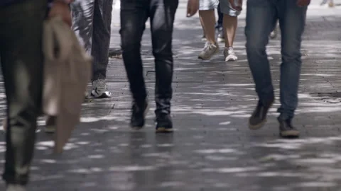 Legs walking on a pavement 25fps Stock Footage 165280270