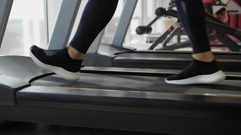 Legs walking on treadmill Stock Footage 118072510