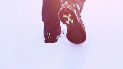 Legs in Winter Boots Walking through Thick Snow. STABILIZED SLOW MOTION 120fps. Video stock 68828164