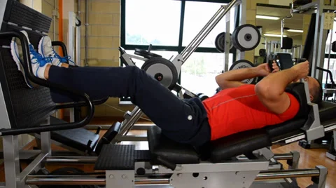 Legs workout. Man at the gym. Stock Footage 34369262
