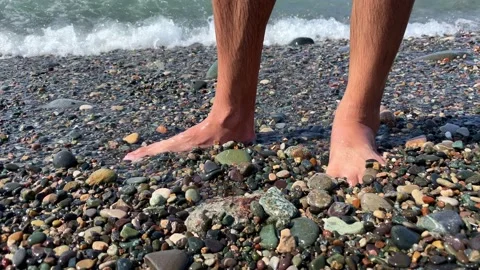 Legs of young man in close-up. Video stock 229548741