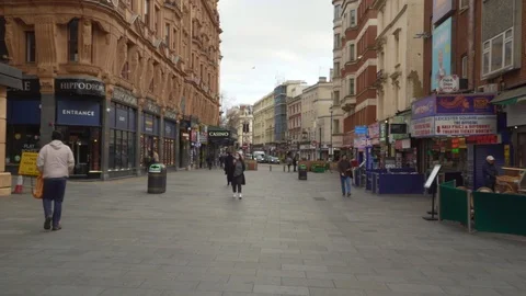 Leicester Square - lady in face mask Stock Footage