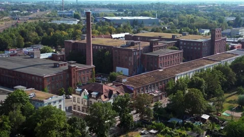 Leipzig cotton spinning mill brick buildings Stunning aerial view flight drone Stock Footage 283845760