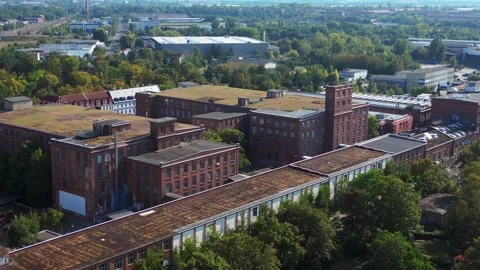 Leipzig cotton spinning mill brick buildings Smooth aerial view flight drone Stock Footage 283845845