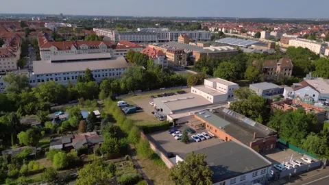 Leipzig cotton spinning mill brick buildings Amazing aerial view flight drone Video stock 283845935