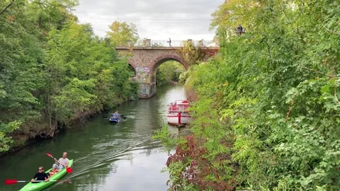 Leipzig, Germany, 07-13-2023 canoes at the Karl-Heine-Kanal, exploring the town Stock Footage 266004523