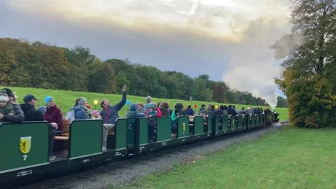 Leipzig, Germany 10-15-2023 a steam leisure train driving around Auensee Lake Stock-Footage 318847753