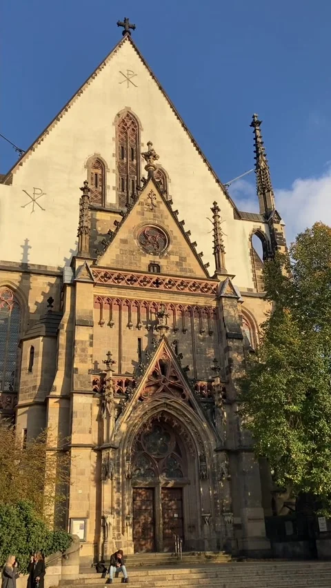 Leipzig, Germany 11-15-2024 Thomas Church in autumn light vertical view Video stock 340884908