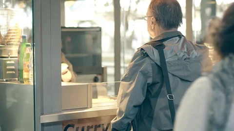 LEIPZIG, GERMANY - MAY 1, 2018. Traditional currywurst or pork sausage fastfood Stock Footage 89868271