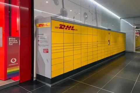 Leipzig, Germany, May 4, 2026: Dhl's distinctive yellow parcel lockers in a c Stock Photos