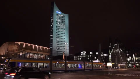 Leipzig MDR Building at Night with Tram passing Traffic, Leipzig, Germany Stock-Footage 141643847